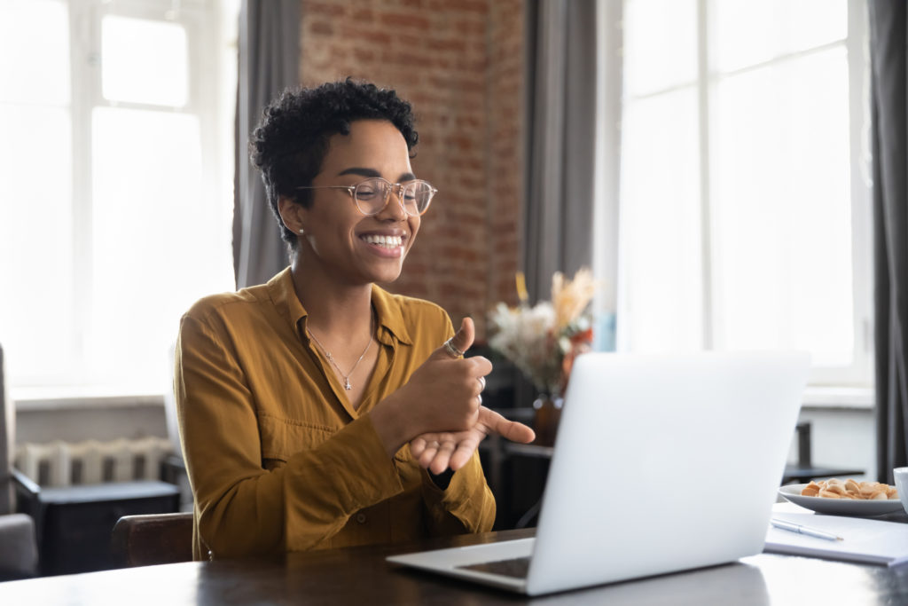 Lady with hearing disability on computer